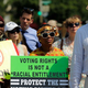Supporters of the Voting Rights Act listen to speakers outside the Supreme Court. (Win McNamee/Getty Images)